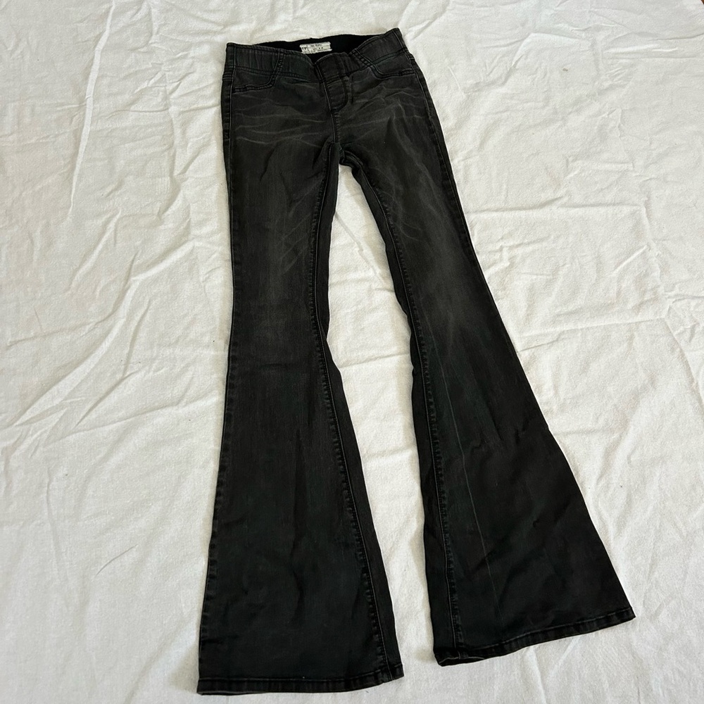 Free people black washed flare pull on jeans. Size 26.